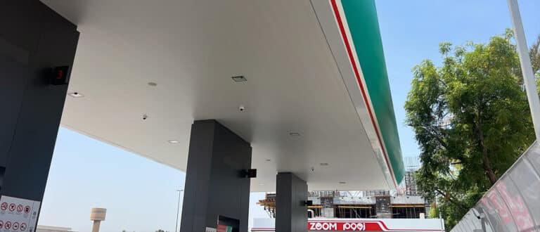 Gas station lighting with smart motion sensor